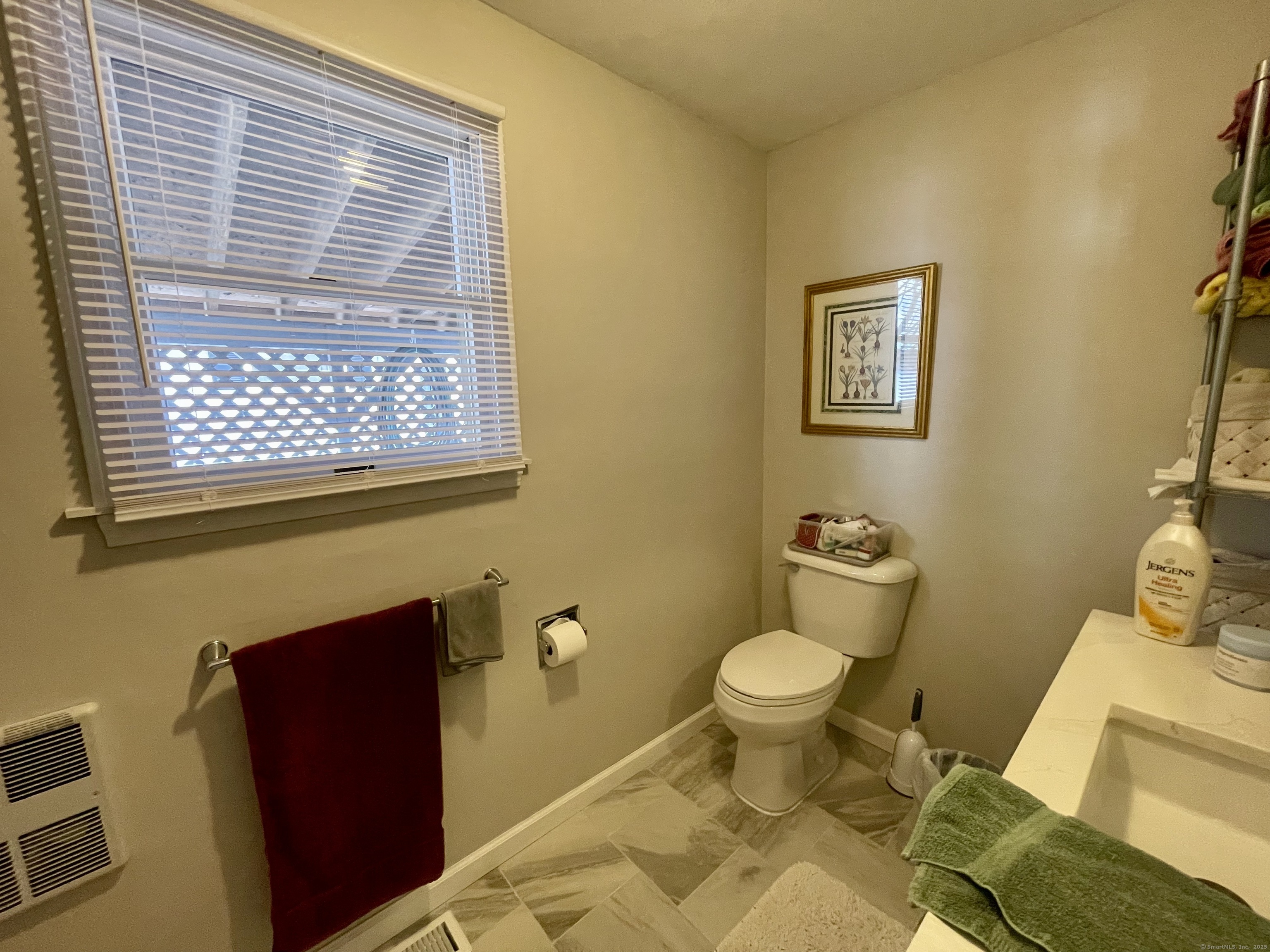 203 Pine Hollow Road Killingly, CT 06241 - Photo 18 of 33 a bathroom with a toilet and a sink
