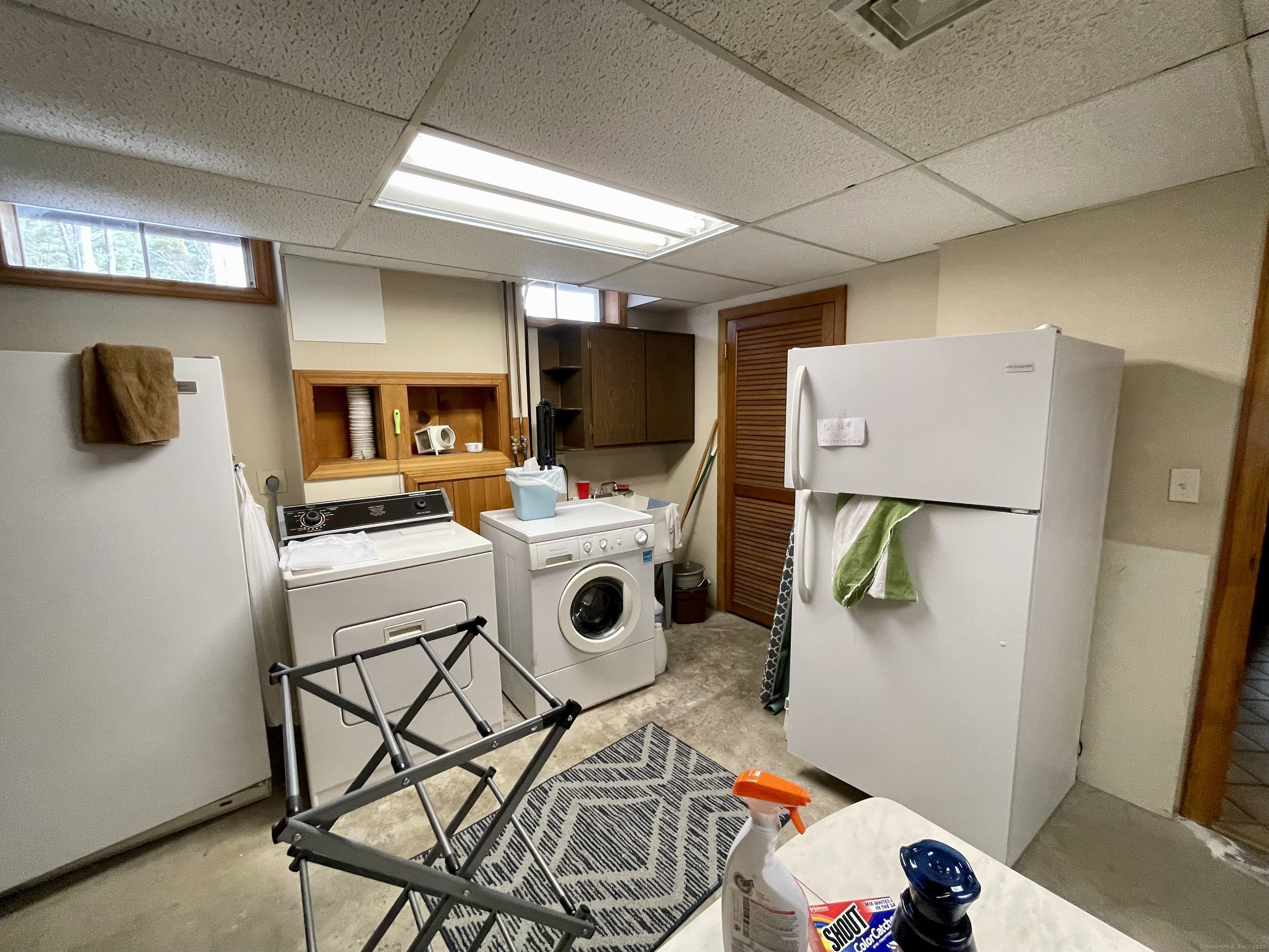 203 Pine Hollow Road Killingly, CT 06241 - Photo 19 of 33 a storage room with washer and dryer