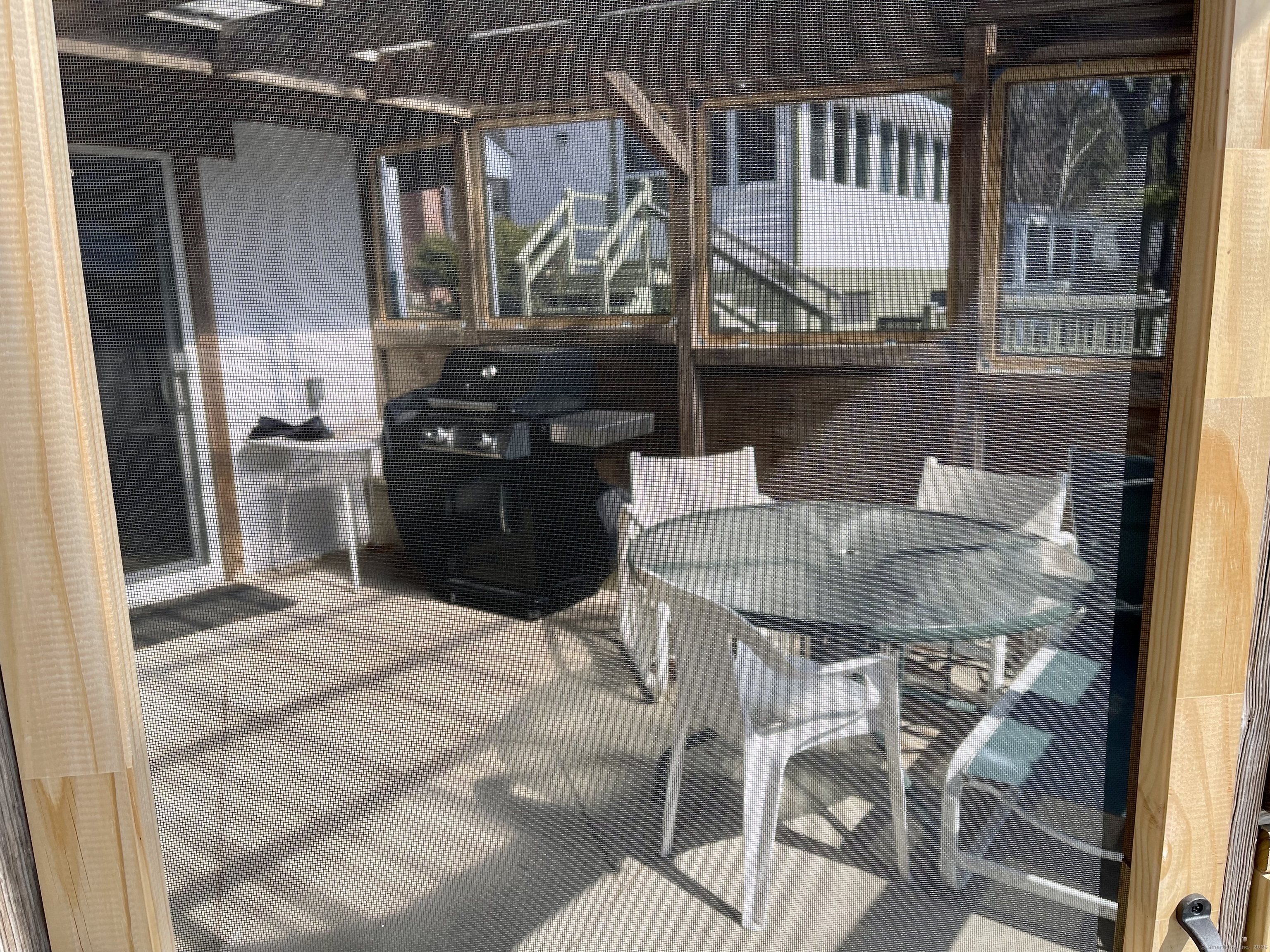 203 Pine Hollow Road Killingly, CT 06241 - Photo 20 of 33 a kitchen with a table and chairs in it