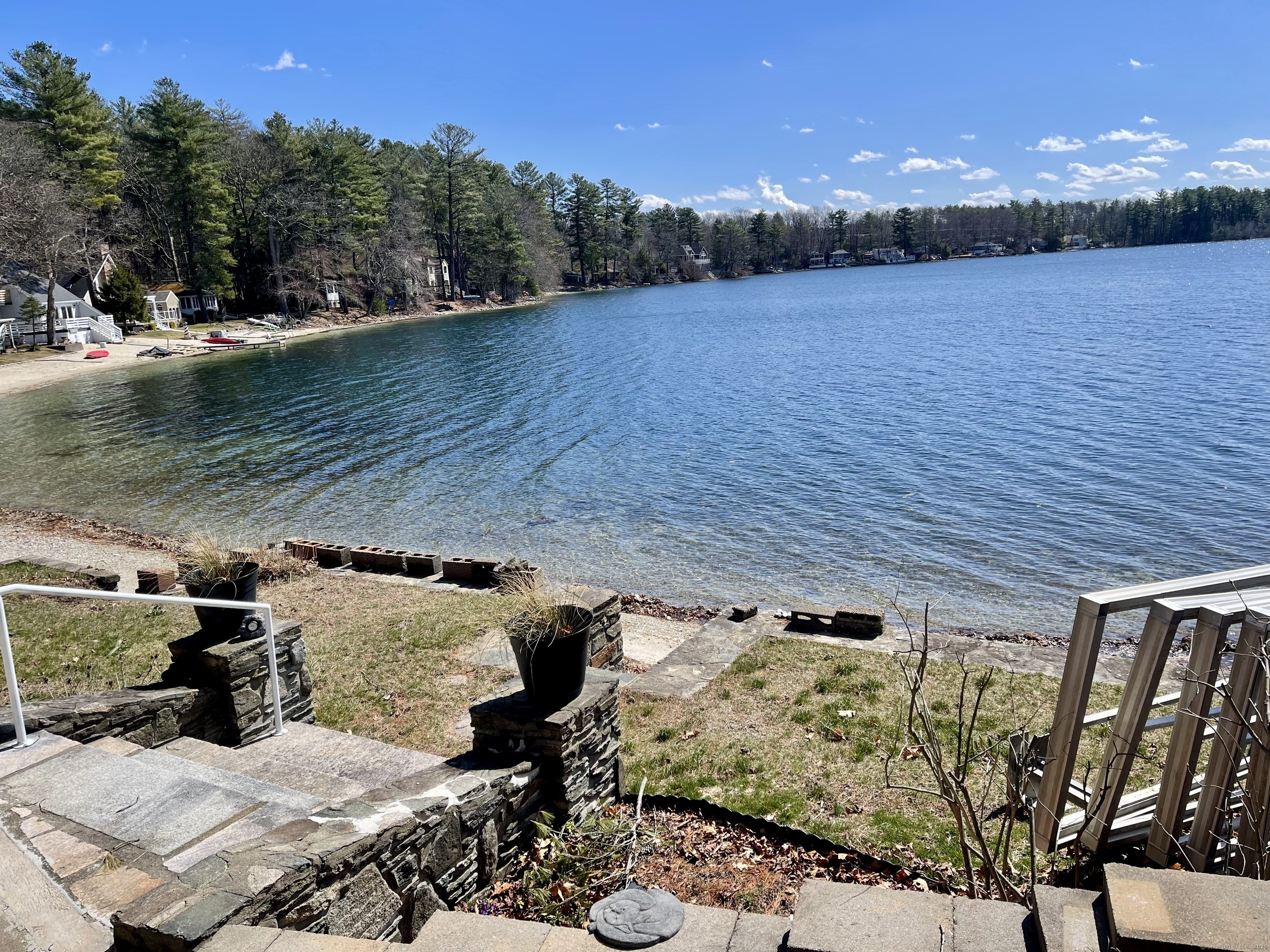 203 Pine Hollow Road Killingly, CT 06241 - Photo 22 of 33 a view of a backyard with plants and lake view
