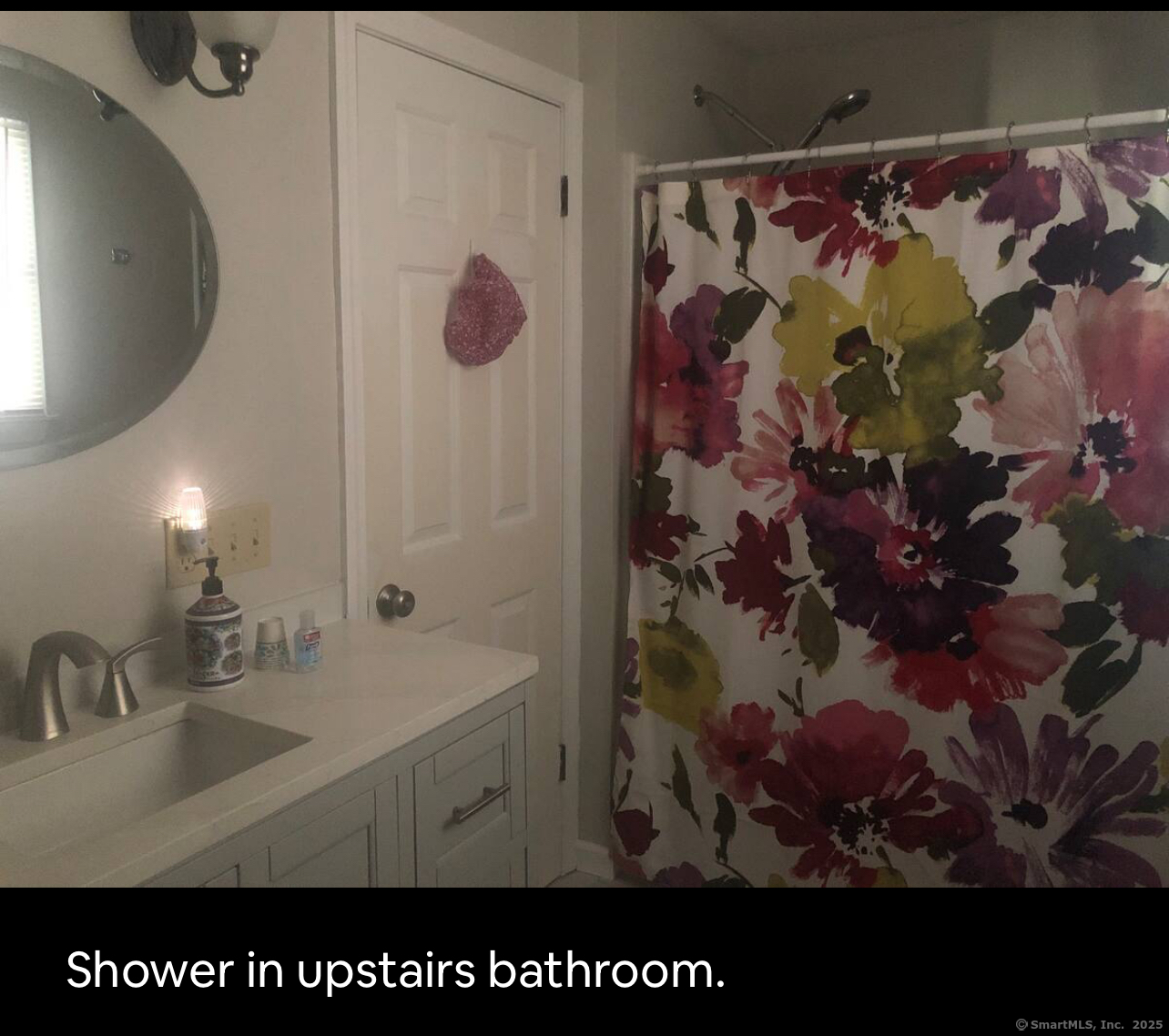 203 Pine Hollow Road Killingly, CT 06241 - Photo 25 of 33 a bathroom with a sink and a mirror