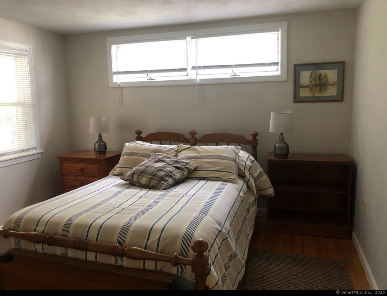 203 Pine Hollow Road Killingly, CT 06241 - Photo 29 of 33 a bedroom with a bed and a window