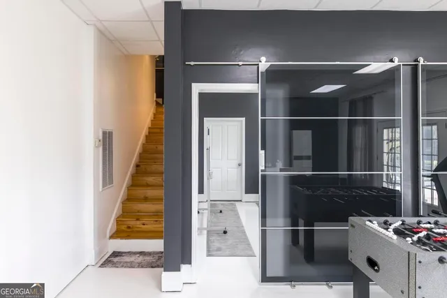 a view of entryway with wooden floor