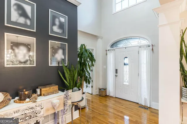 a view of a livingroom with furniture and front door