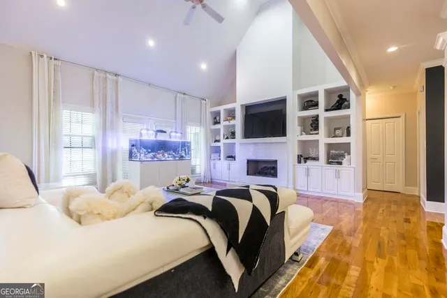 a bed room with a bed and a television