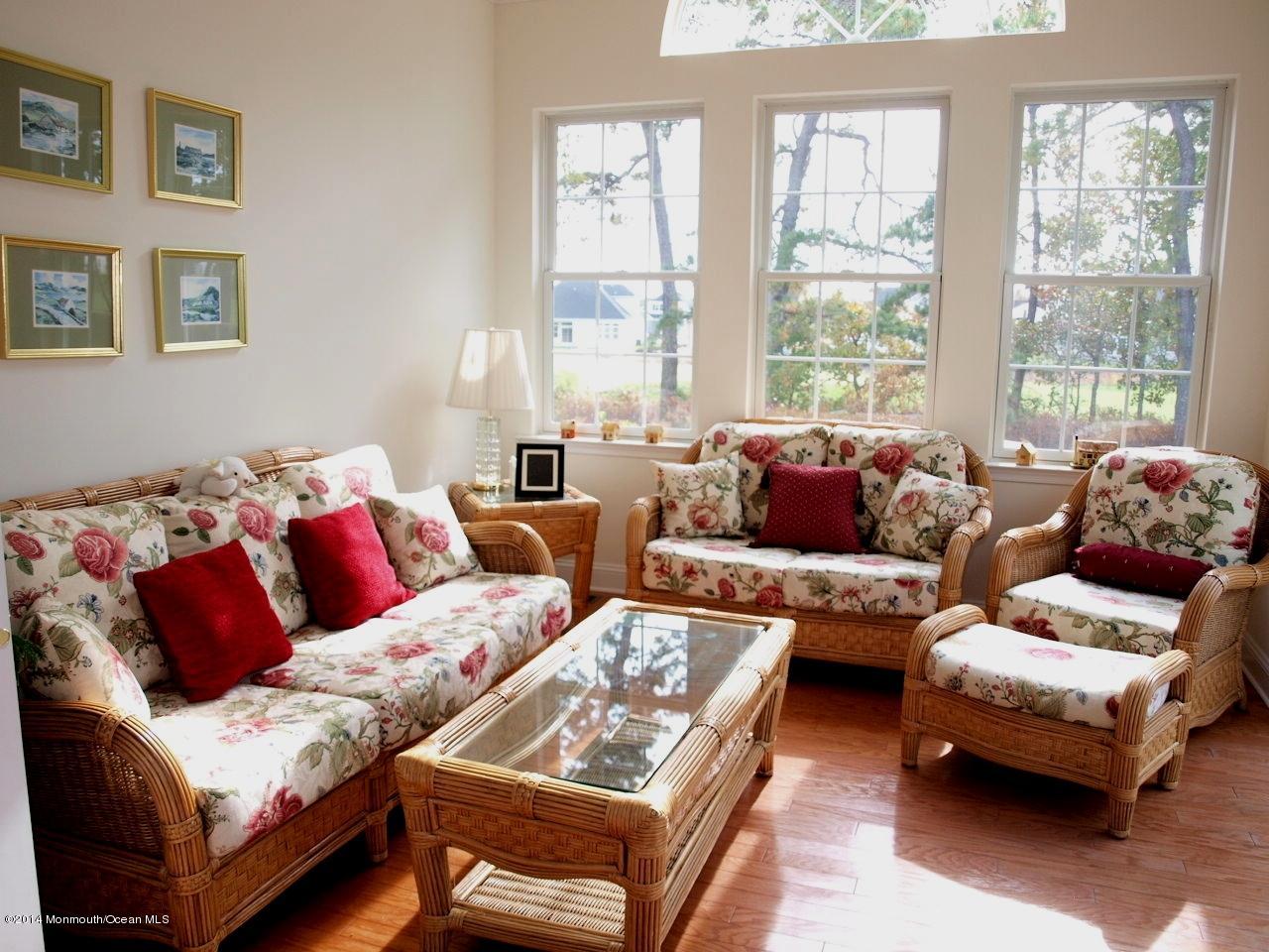 80 Pancoast Road Waretown, NJ 08758 - Photo 14 of 32 a living room with furniture and a large window