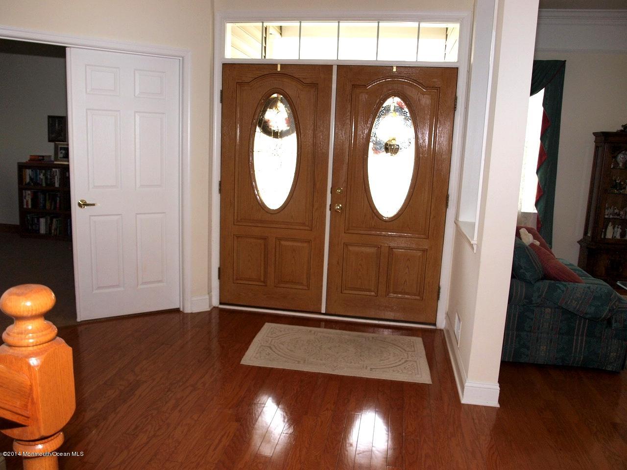 80 Pancoast Road Waretown, NJ 08758 - Photo 19 of 32 a view of a hallway with wooden floor