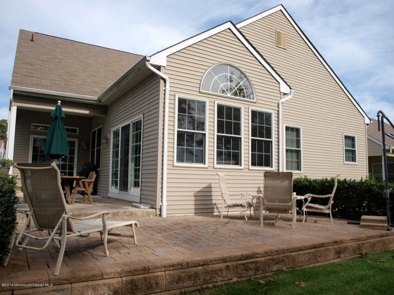 80 Pancoast Road Waretown, NJ 08758 - Photo 3 of 32 a view of a house with patio