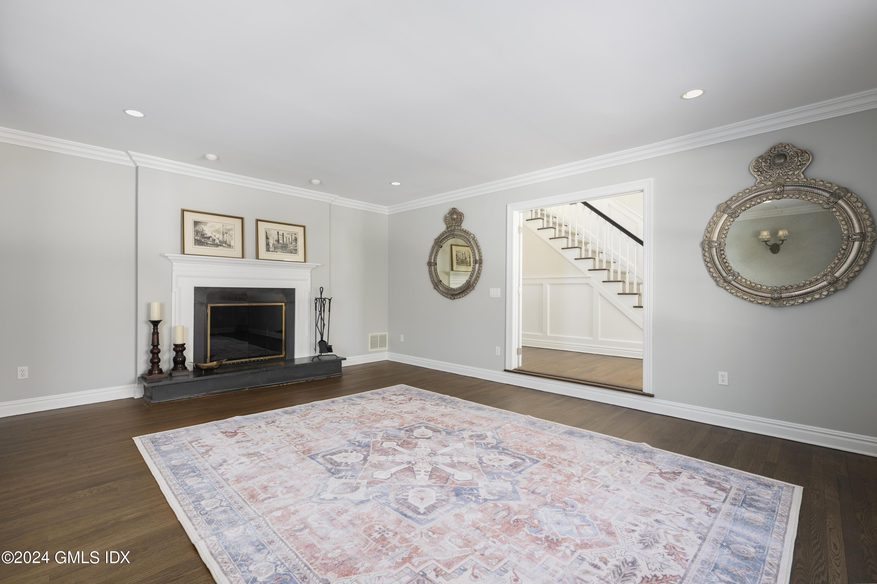 17 Rustic View Road Greenwich, CT 06830 - Photo 11 of 26 a view of a livingroom with furniture and a fireplace