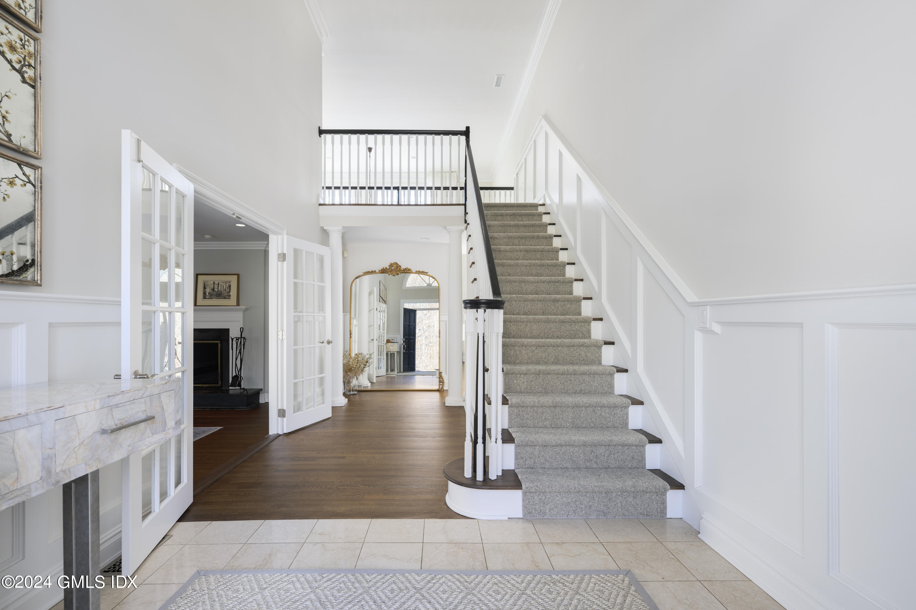 17 Rustic View Road Greenwich, CT 06830 - Photo 3 of 26 a view of entryway and hall with wooden floor