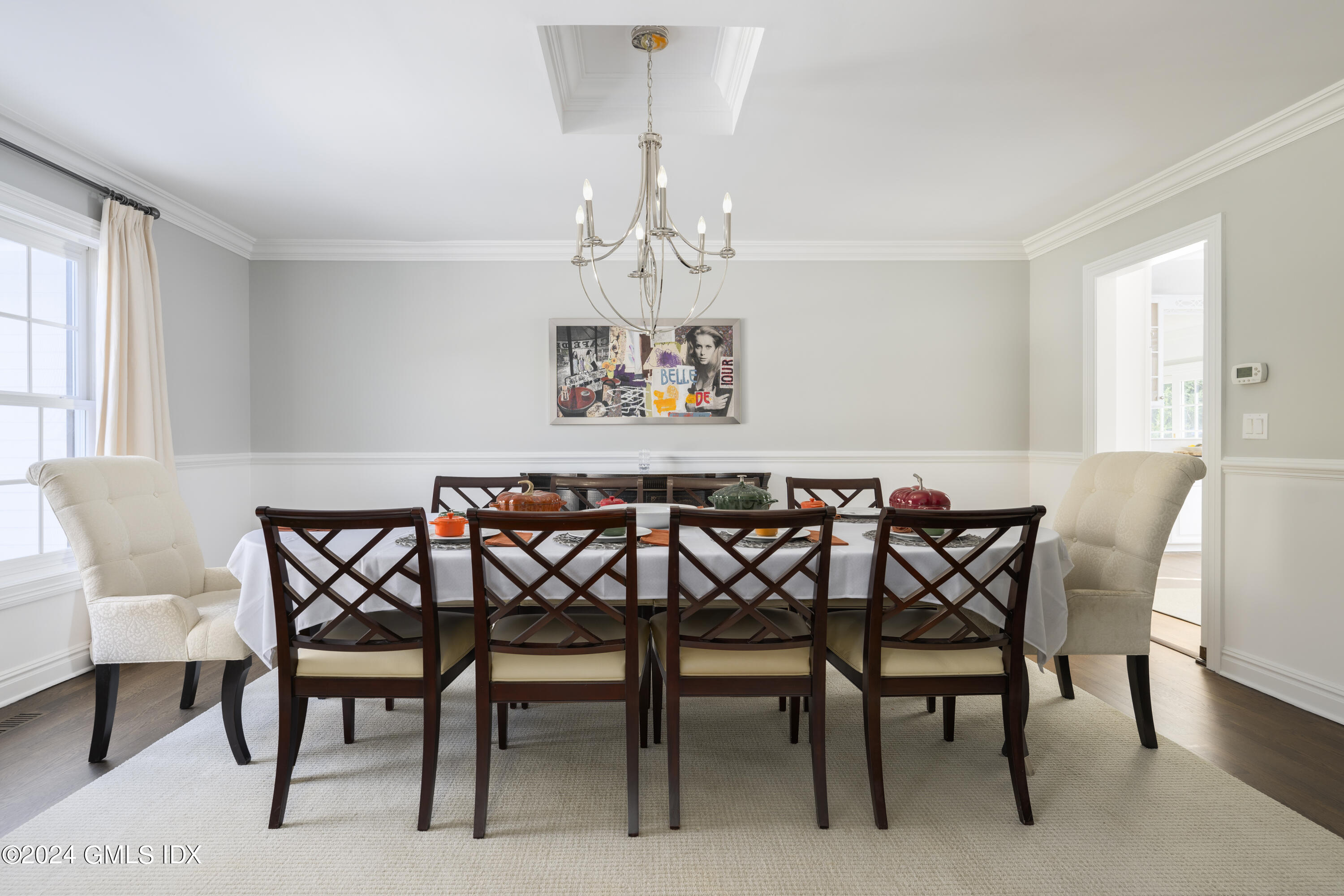 17 Rustic View Road Greenwich, CT 06830 - Photo 10 of 26 a view of a dining room with furniture and a chandelier