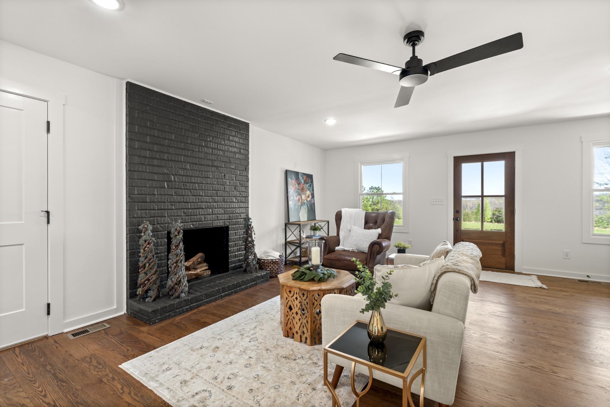 2210 Garners Creek Road Dickson, TN 37055 - Photo 11 of 67 a living room with furniture and a fireplace