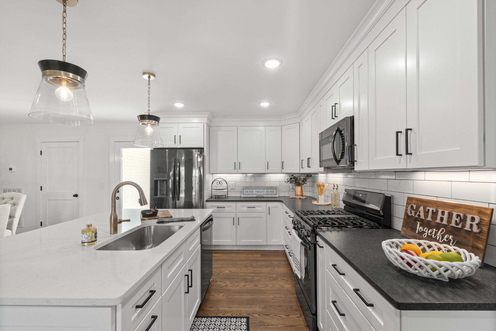 2210 Garners Creek Road Dickson, TN 37055 - Photo 15 of 67 a kitchen with stainless steel appliances granite countertop a sink stove and refrigerator