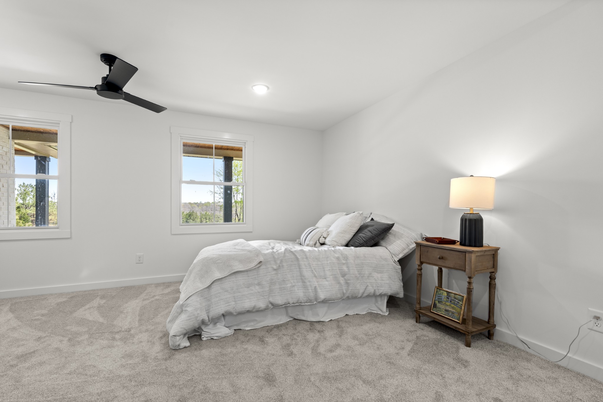 2210 Garners Creek Road Dickson, TN 37055 - Photo 19 of 67 a bedroom with a bed and a window