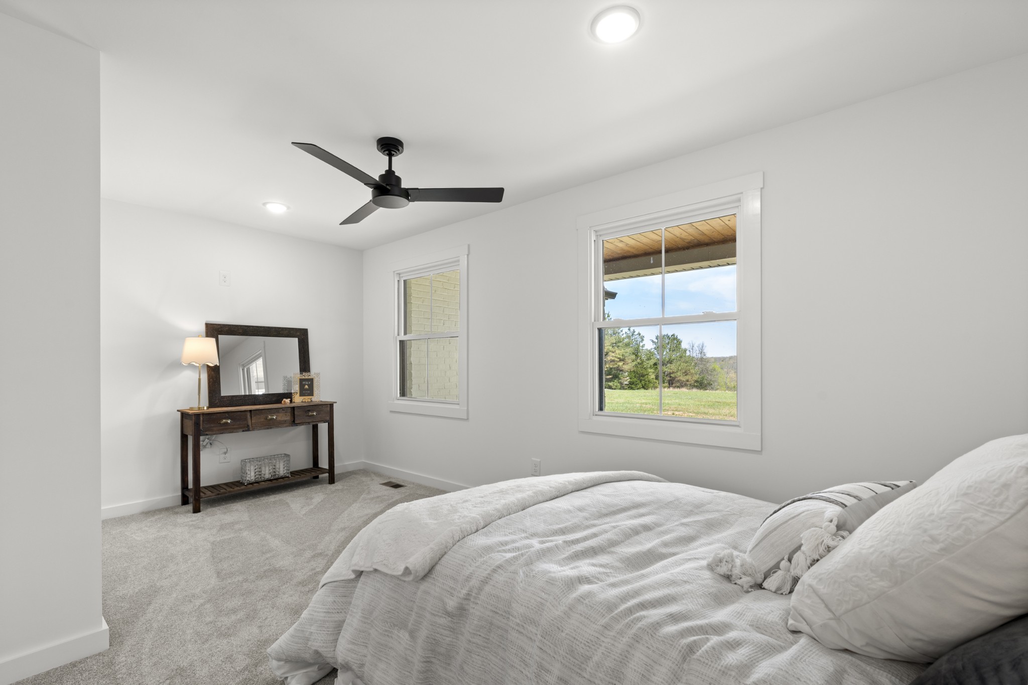 2210 Garners Creek Road Dickson, TN 37055 - Photo 20 of 67 a bedroom with a bed and a window