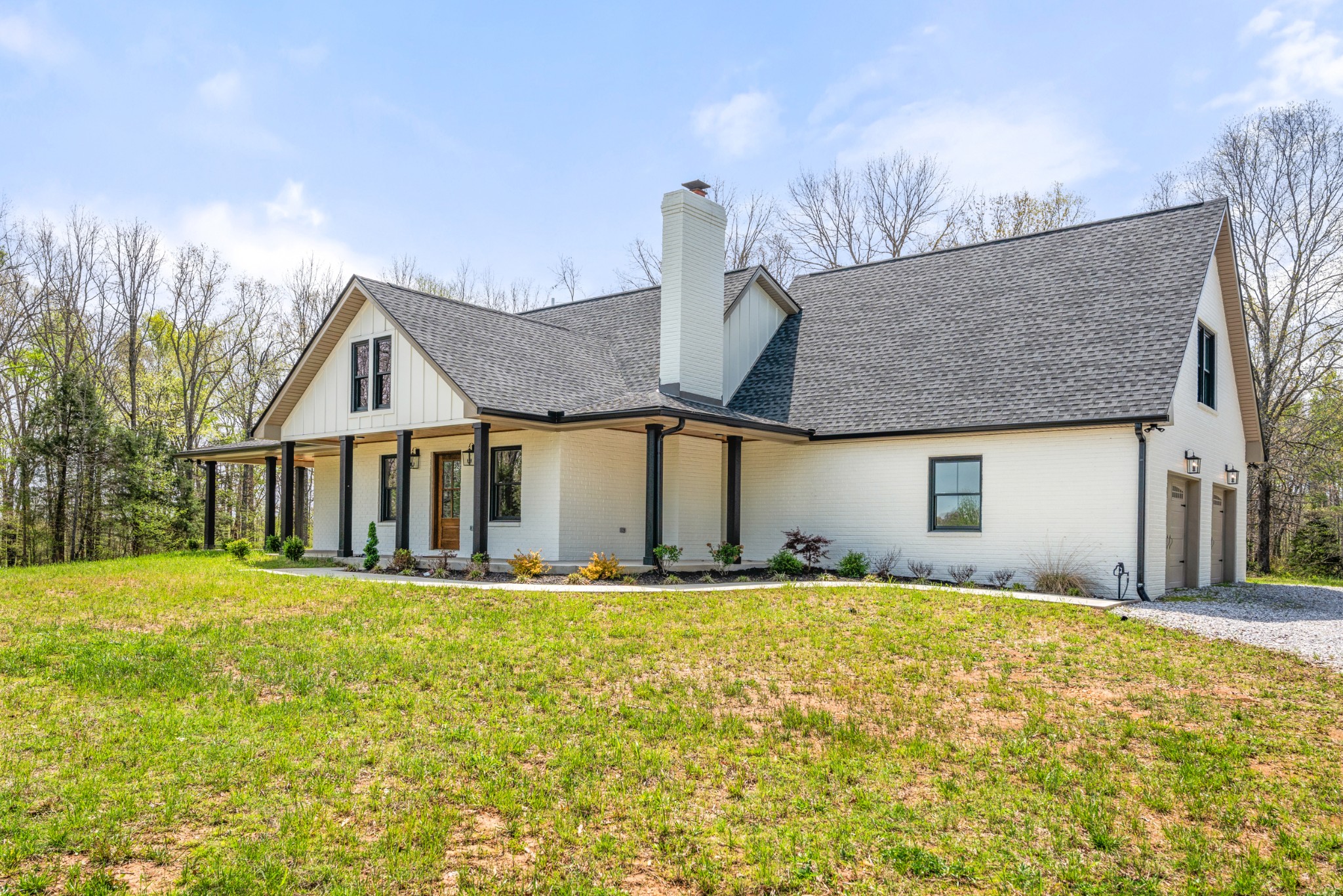 2210 Garners Creek Road Dickson, TN 37055 - Photo 2 of 67 a front view of a house with yard and trees
