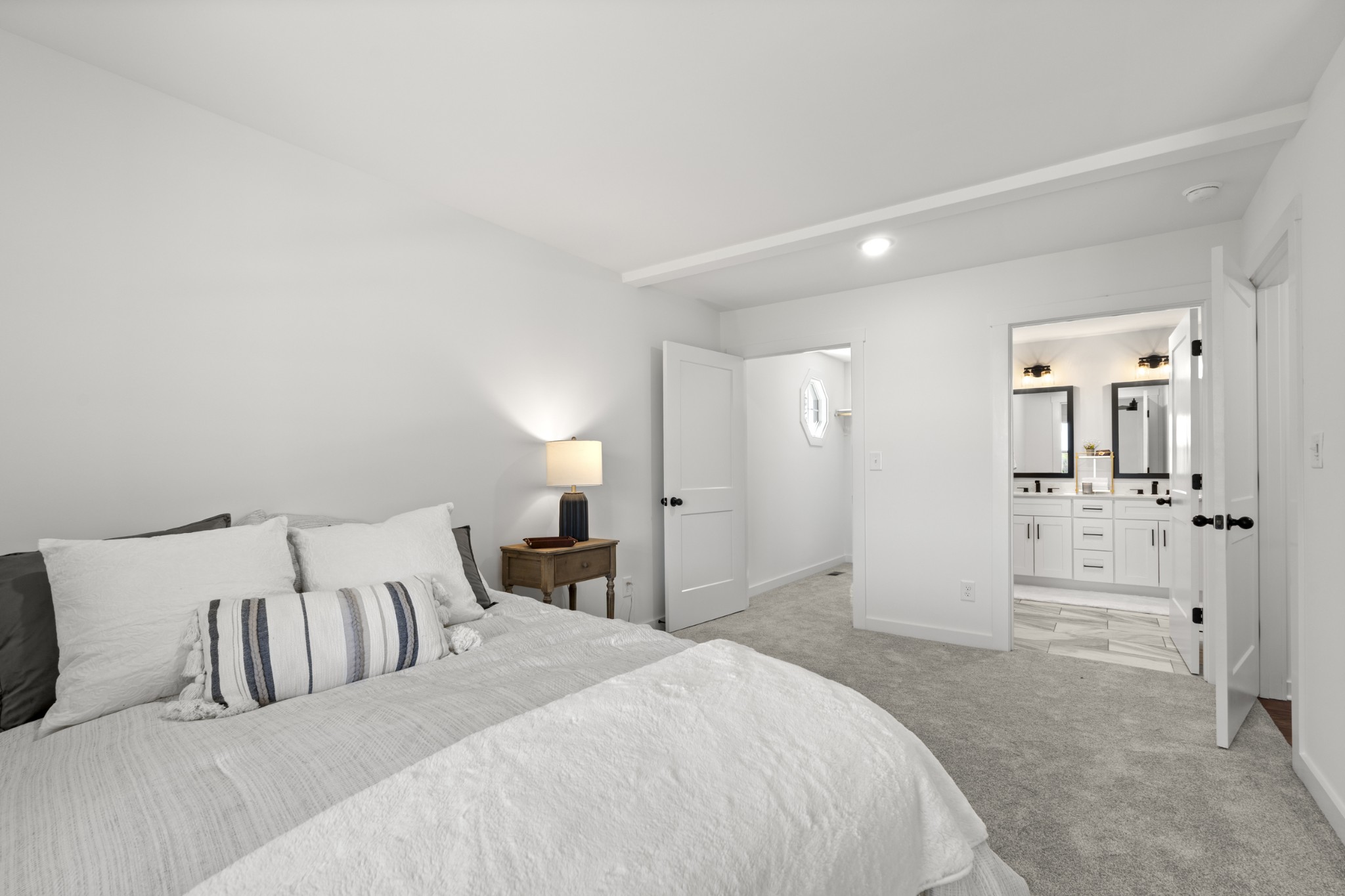 2210 Garners Creek Road Dickson, TN 37055 - Photo 21 of 67 a spacious bedroom with a bed and a view of bathroom