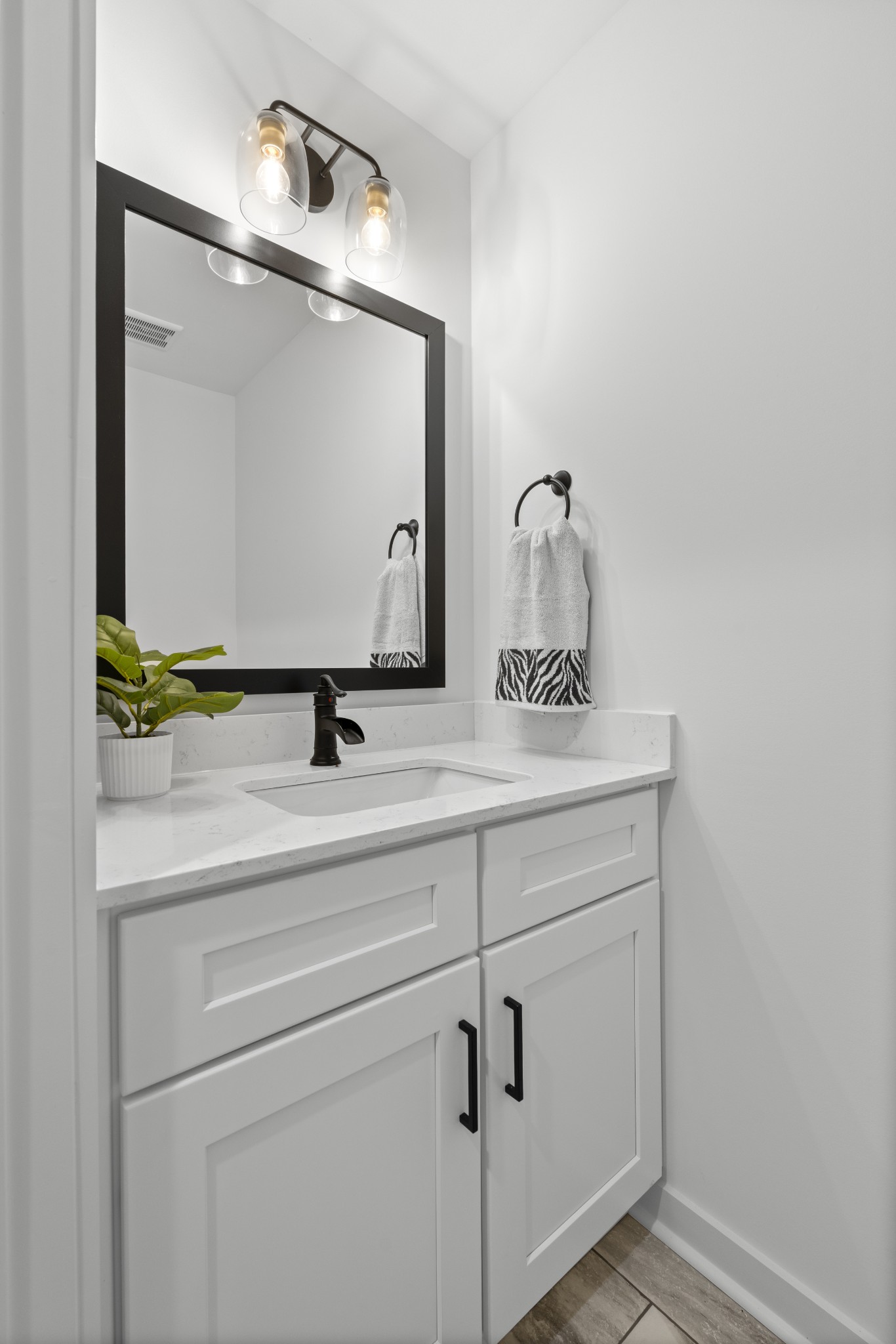 2210 Garners Creek Road Dickson, TN 37055 - Photo 25 of 67 a bathroom with a sink and mirror