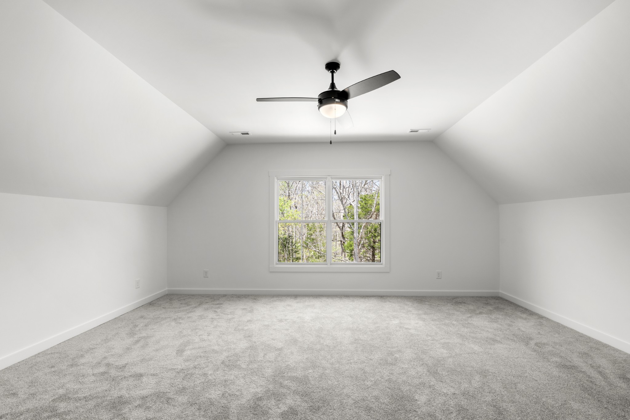 2210 Garners Creek Road Dickson, TN 37055 - Photo 31 of 67 an empty room with windows and ceiling fan