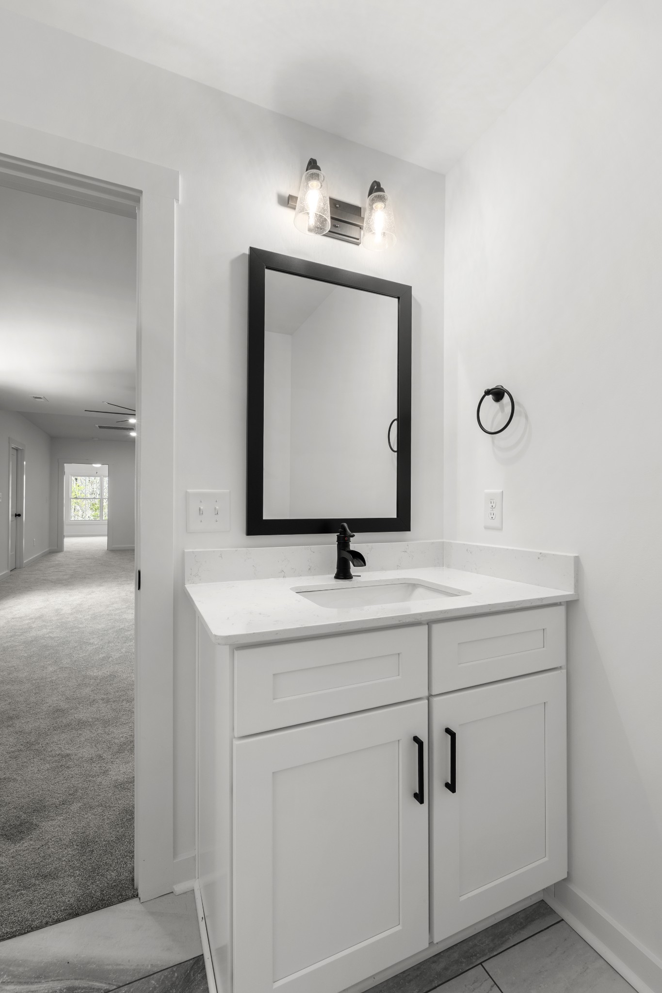 2210 Garners Creek Road Dickson, TN 37055 - Photo 35 of 67 a bathroom with a sink and mirror