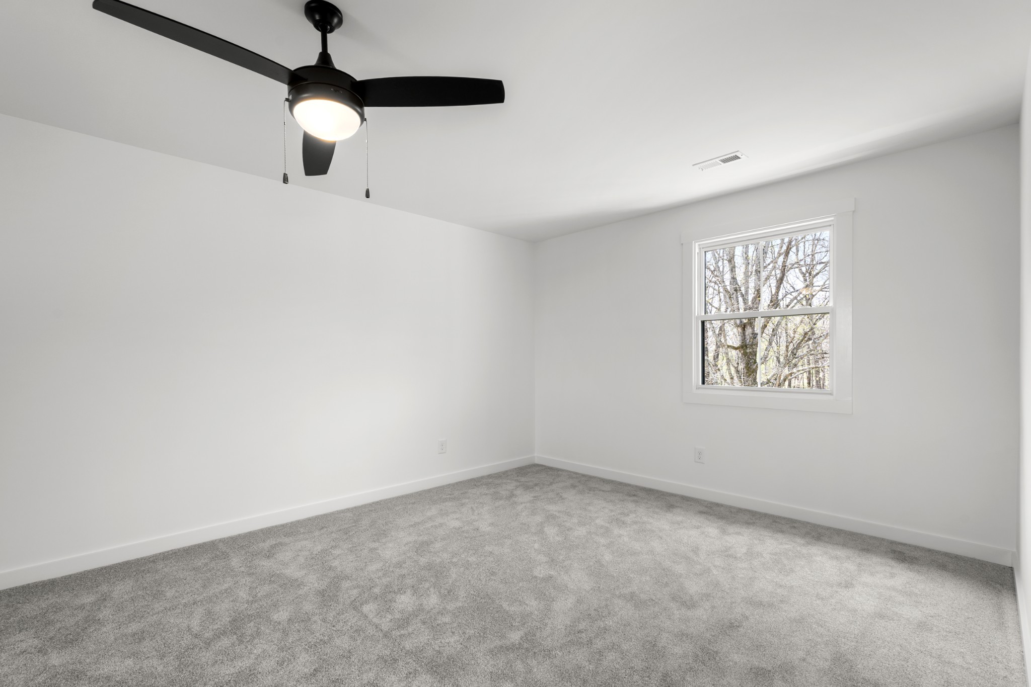 2210 Garners Creek Road Dickson, TN 37055 - Photo 37 of 67 an empty room with a window