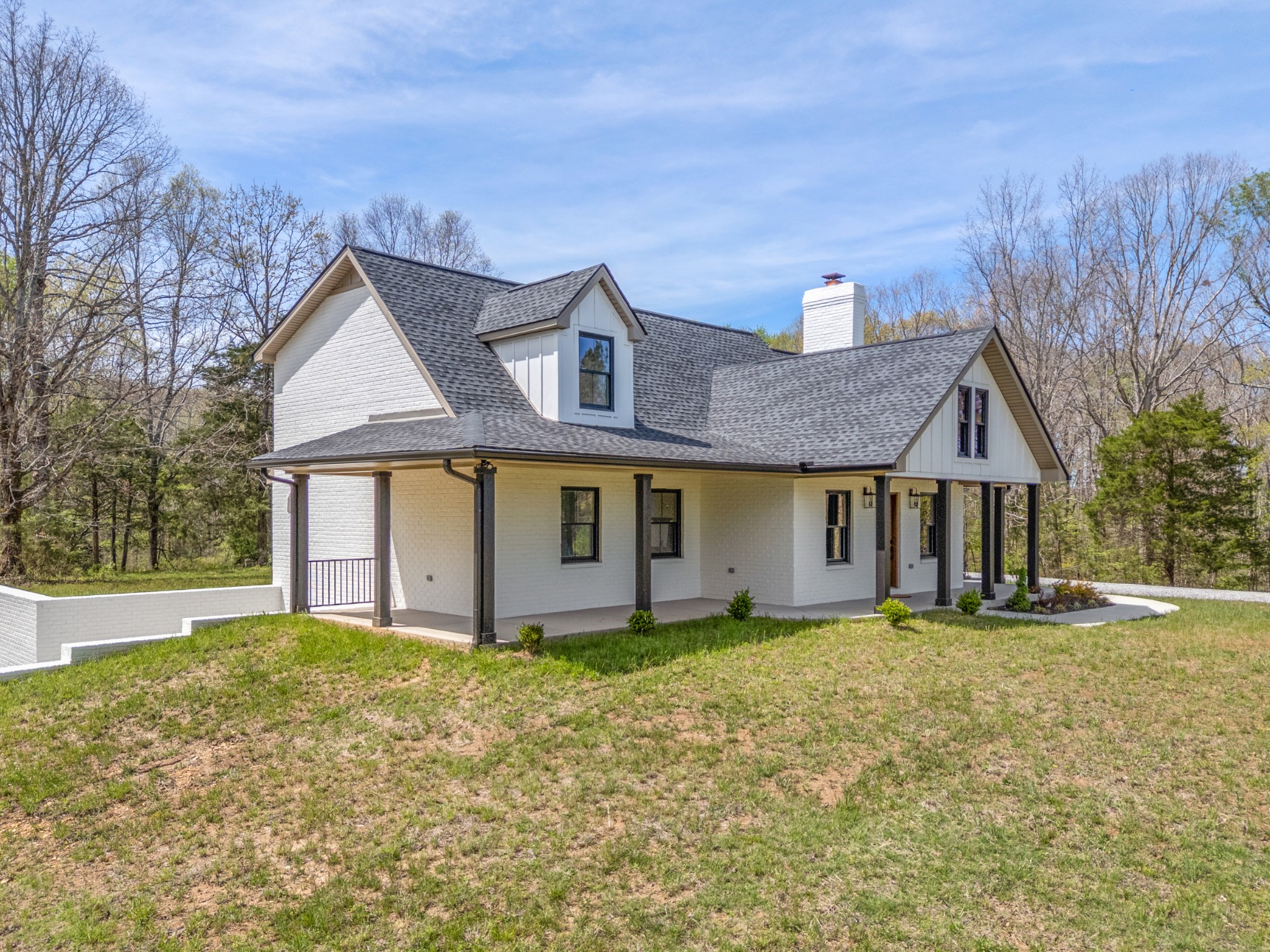 2210 Garners Creek Road Dickson, TN 37055 - Photo 55 of 67 front view of a house with a yard