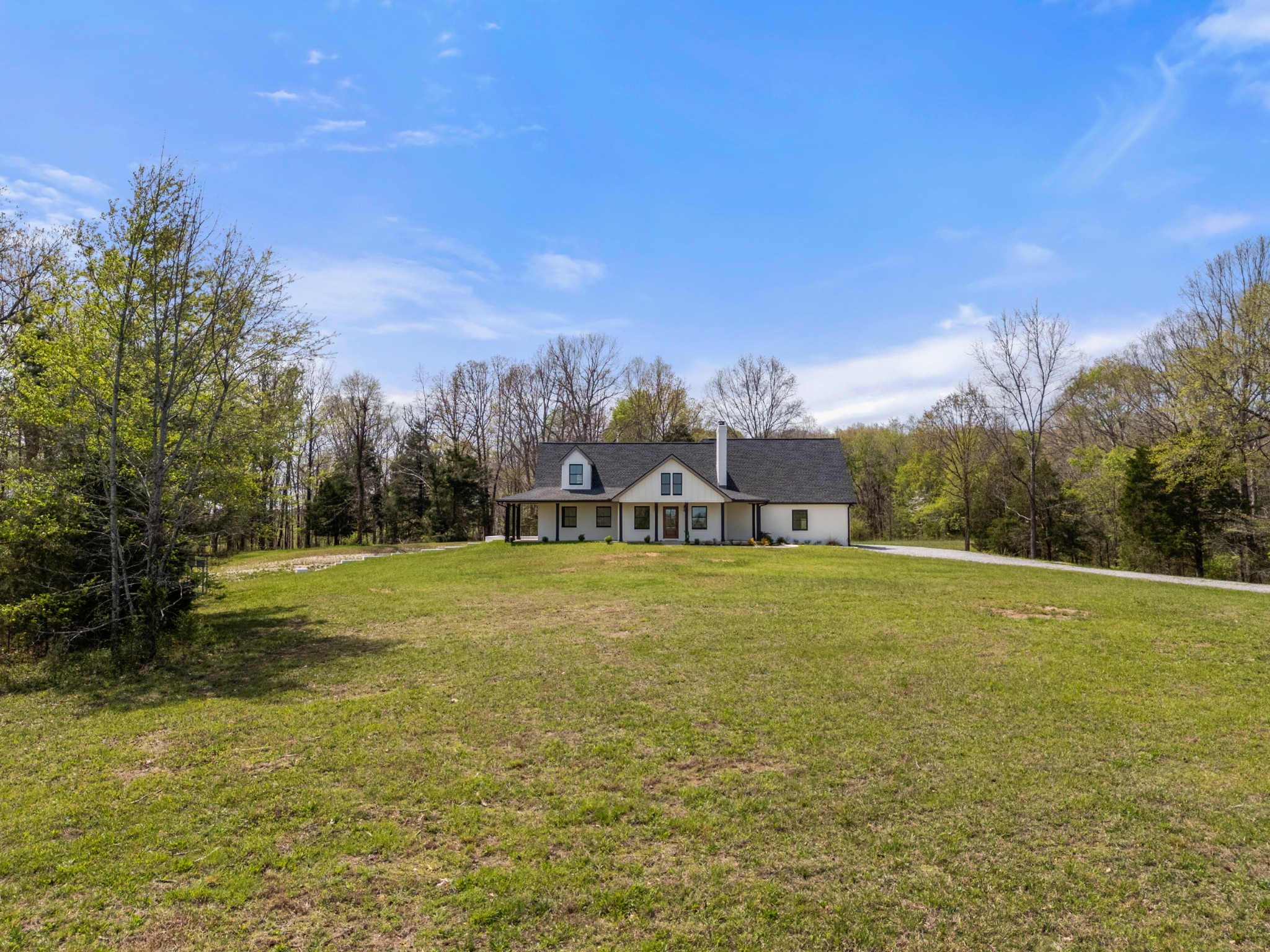 2210 Garners Creek Road Dickson, TN 37055 - Photo 56 of 67 a front view of a house with a yard