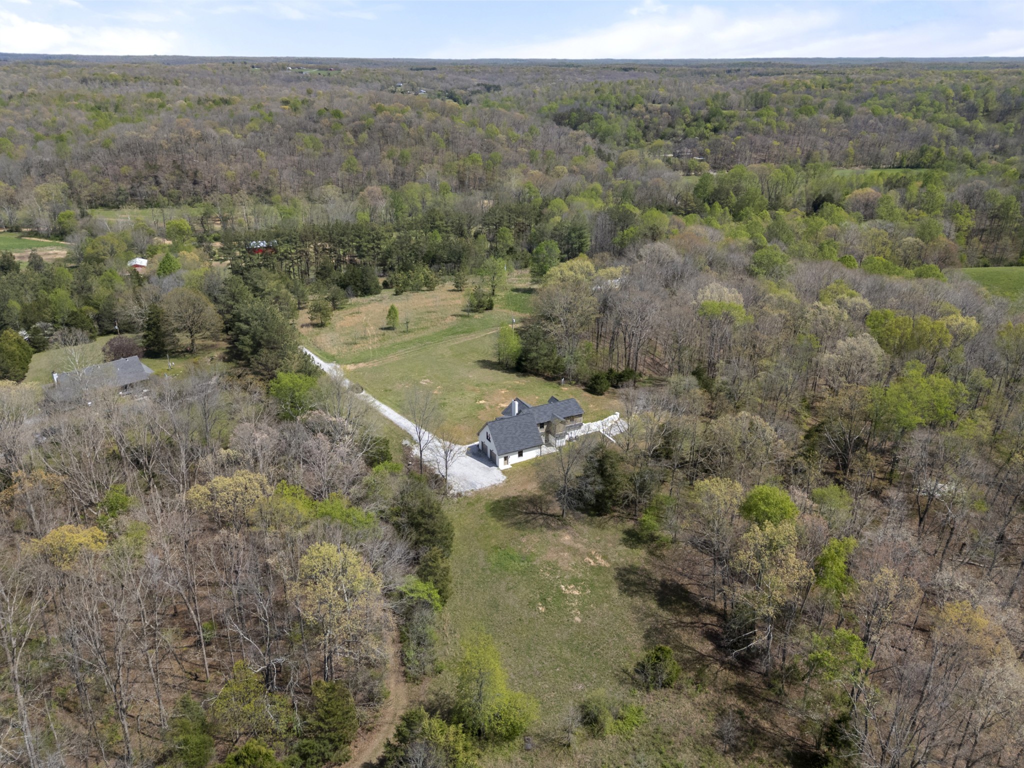 2210 Garners Creek Road Dickson, TN 37055 - Photo 64 of 67 a view of a town with trees in the background