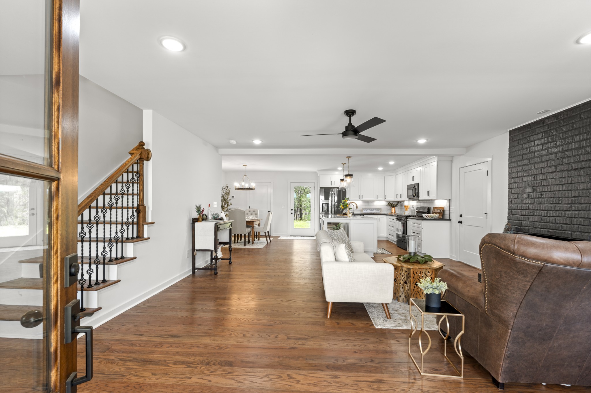 2210 Garners Creek Road Dickson, TN 37055 - Photo 7 of 67 a living room with fireplace furniture and a wooden floor