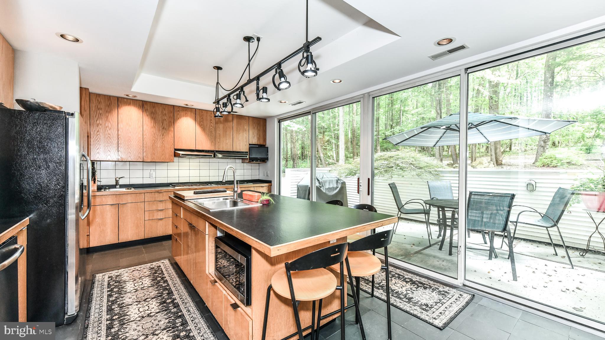 39470 Mt Gilead Road Leesburg, VA 20175 - Photo 11 of 17 Kitchen leads to full glass doors with patio