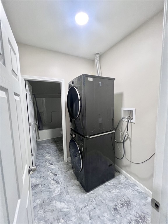 202 Broadway, Unit 33 Lawrence, MA 01840 - Photo 13 of 13 a utility room with dryer and washer