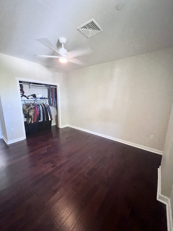 202 Broadway, Unit 33 Lawrence, MA 01840 - Photo 10 of 13 a view of a livingroom with wooden floor