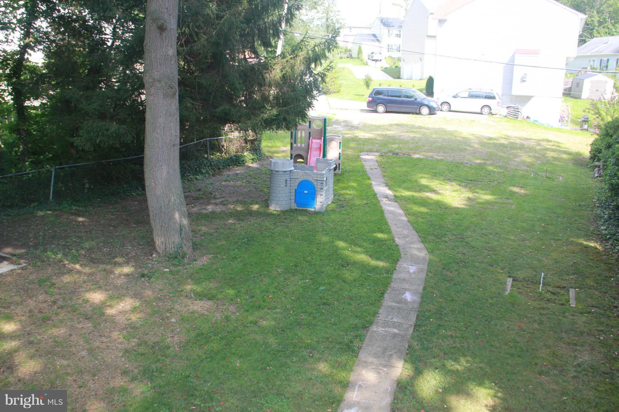 6313 Banbury Road Baltimore, MD 21239 - Photo 5 of 21 a view of a park with large trees