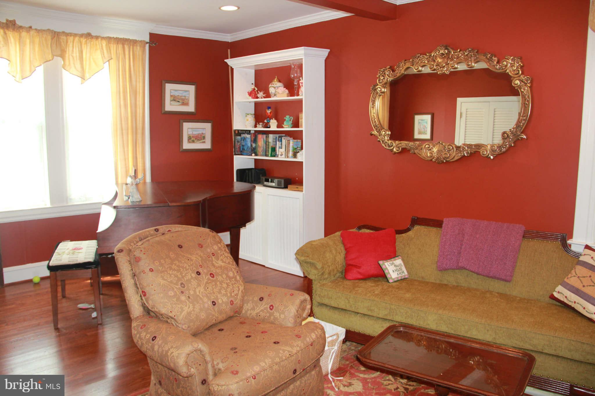6313 Banbury Road Baltimore, MD 21239 - Photo 9 of 21 a living room with furniture and a window