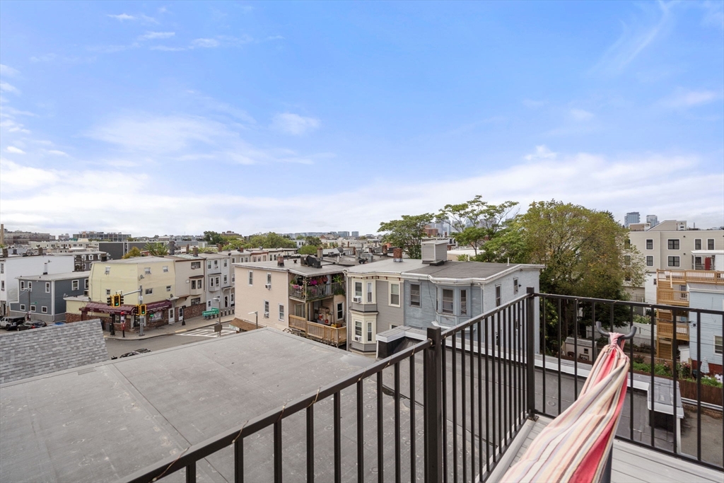 152 Marion Street, Unit 6L Boston, MA 02128 - Photo 19 of 22 a view of a balcony with city view