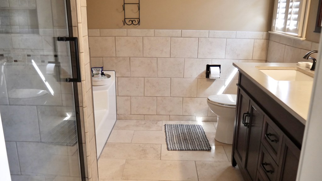 43 Chive Court Columbus, GA 31909 - Photo 23 of 37 a bathroom with a sink and a shower