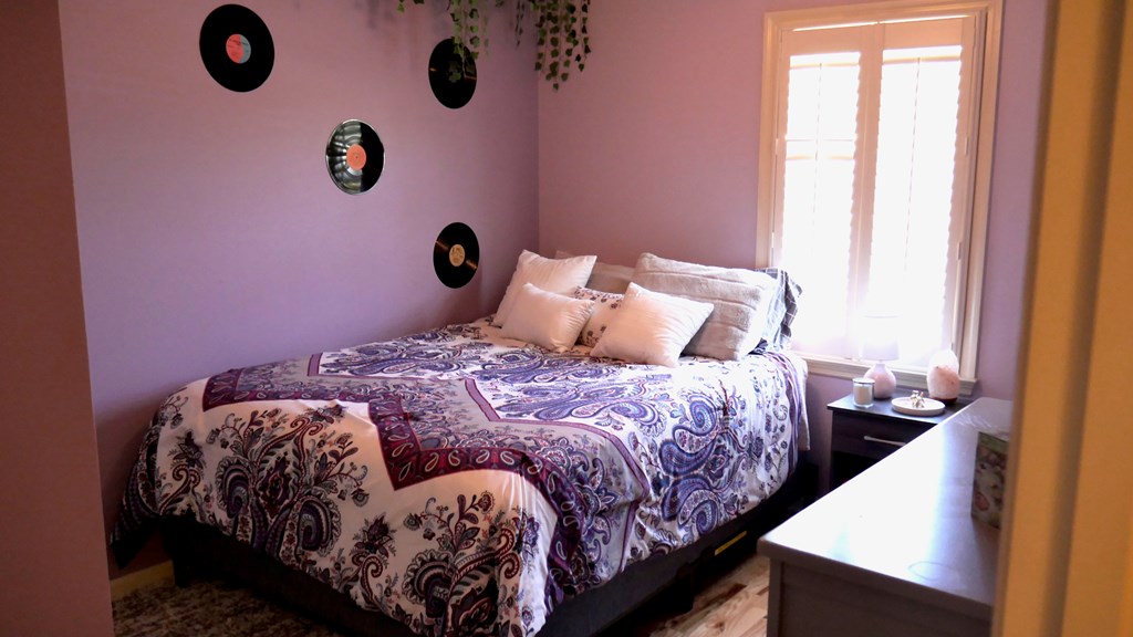 43 Chive Court Columbus, GA 31909 - Photo 28 of 37 a bed sitting in a bedroom next to a window