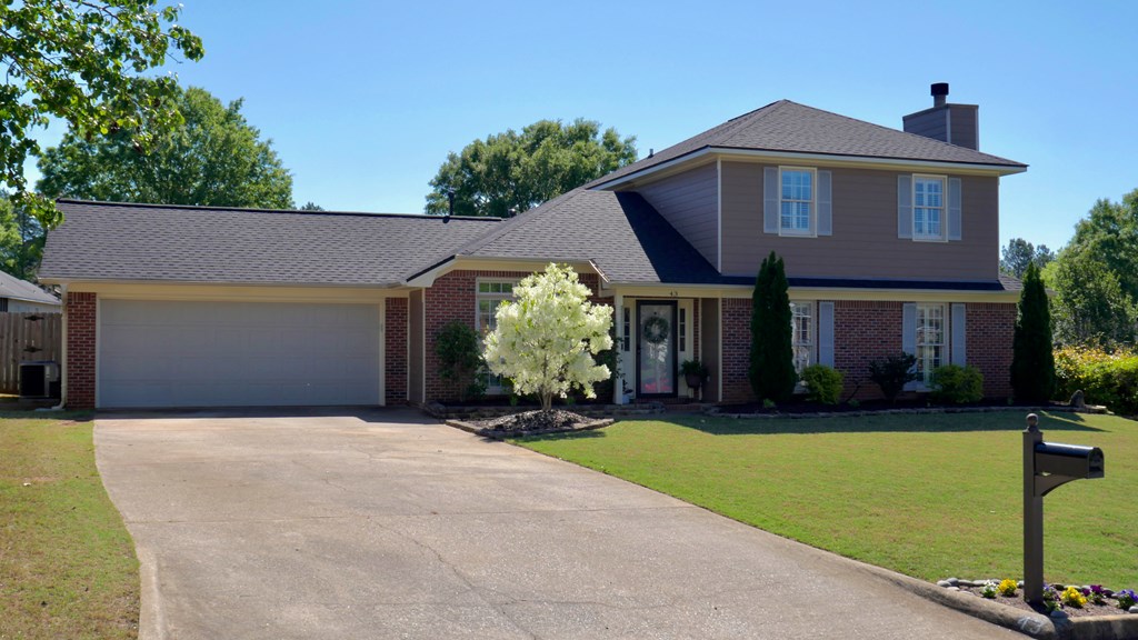 43 Chive Court Columbus, GA 31909 - Photo 37 of 37 a front view of a house with a yard and garage