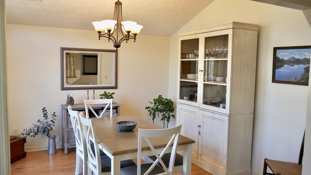 43 Chive Court Columbus, GA 31909 - Photo 9 of 37 a view of a dining room with furniture and chandelier