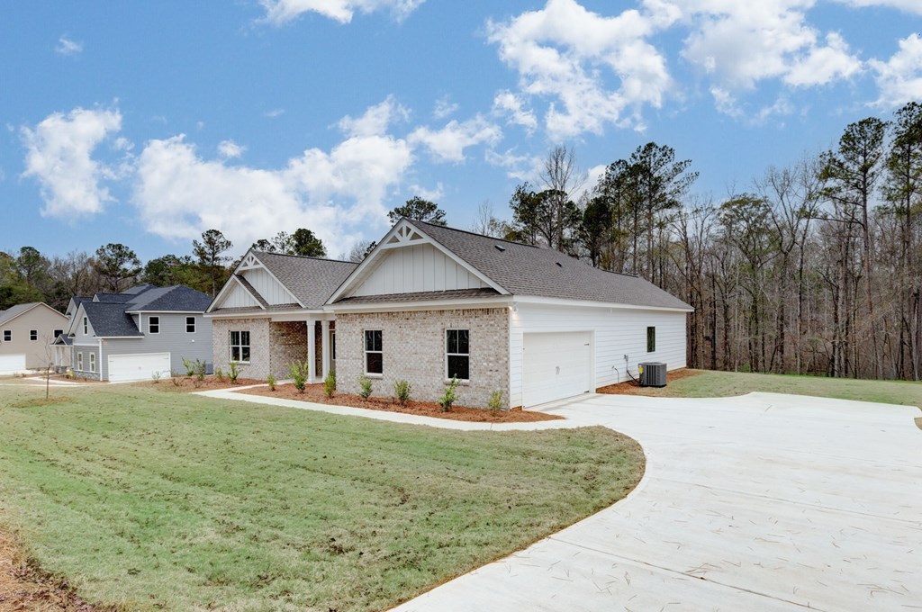 8711 McKee Road Upatoi, GA 31829 - Photo 2 of 45 a view of a house with a outdoor space