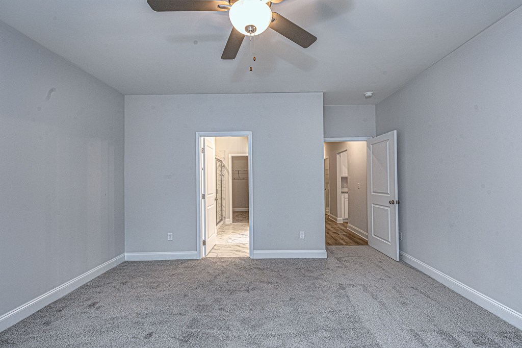 8711 McKee Road Upatoi, GA 31829 - Photo 25 of 45 a view of a livingroom with a ceiling fan and window