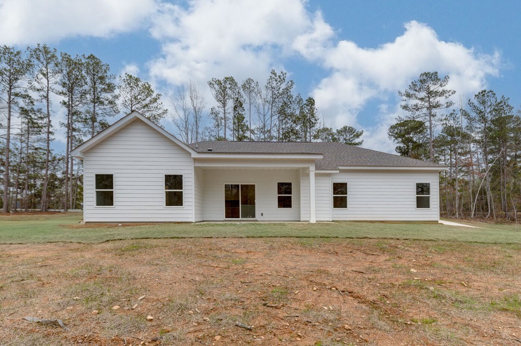 8711 McKee Road Upatoi, GA 31829 - Photo 3 of 45 a view of a house with a yard
