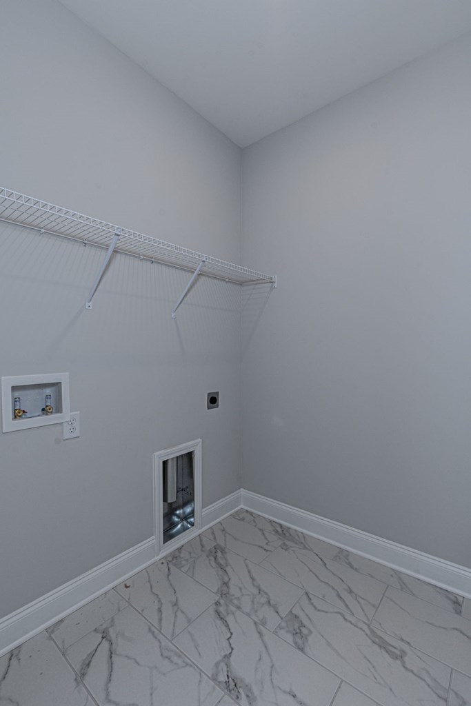 8711 McKee Road Upatoi, GA 31829 - Photo 36 of 45 a view of a room with racks on the wall