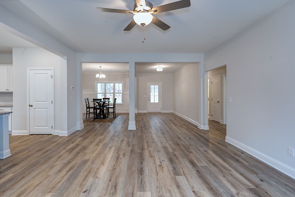 8711 McKee Road Upatoi, GA 31829 - Photo 10 of 45 a view of a livingroom with wooden floor