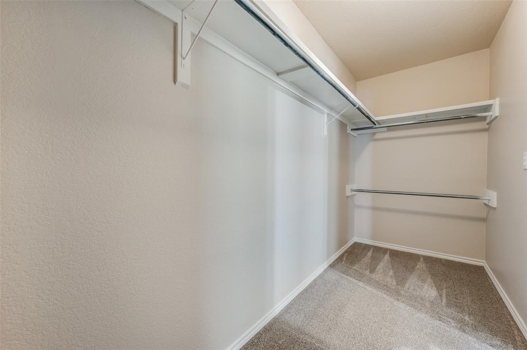 2606 Whetstone Drive Corinth, TX 76210 - Photo 17 of 28 a view of an empty walk in closet