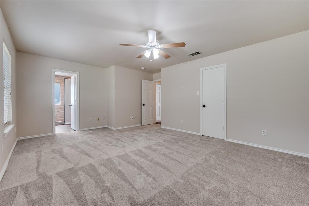 2606 Whetstone Drive Corinth, TX 76210 - Photo 19 of 28 a view of an empty room