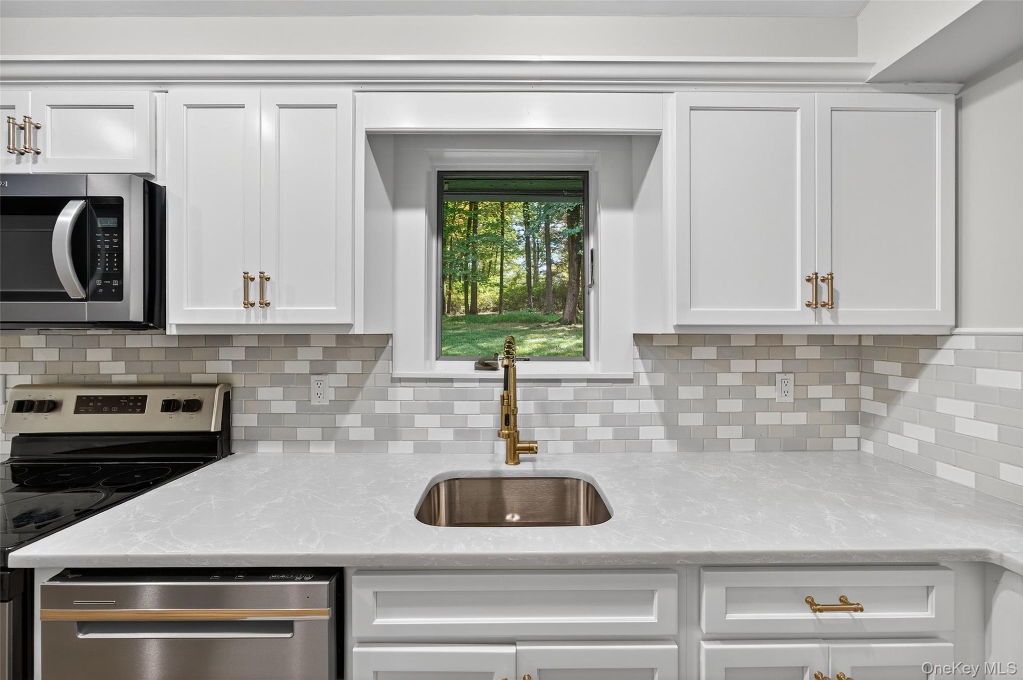 91 Sleepy Valley Road Warwick, NY 10990 - Photo 13 of 30 a kitchen with a sink and cabinets
