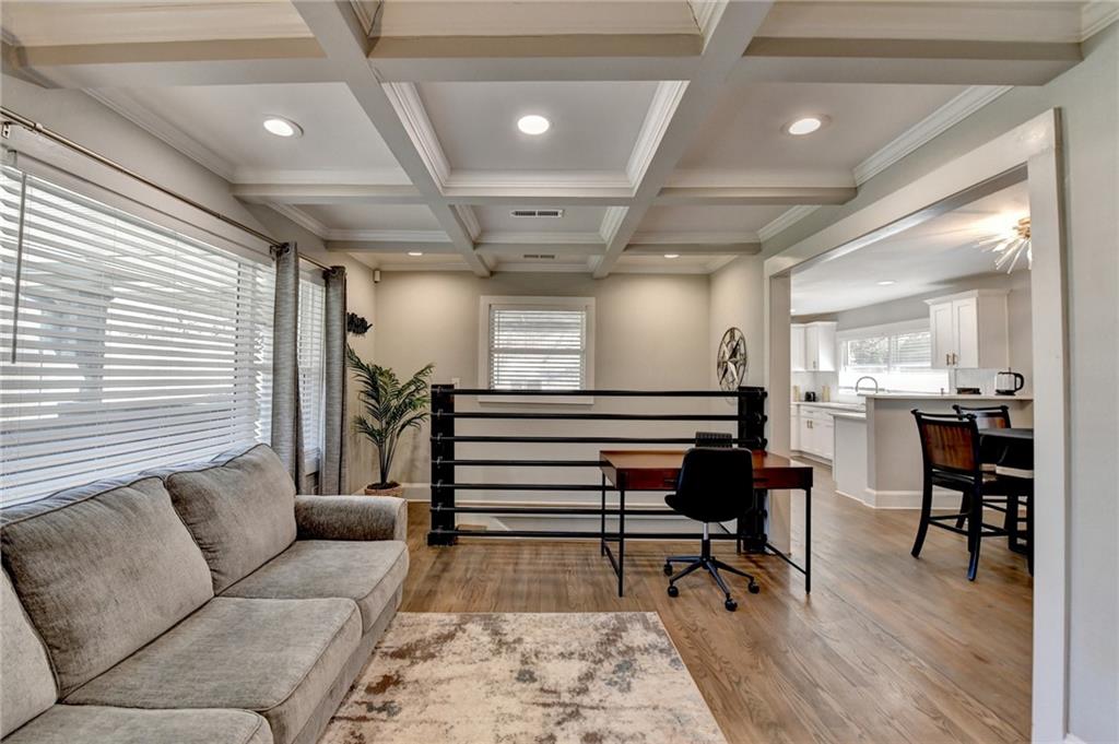 2945 Monterey Drive Decatur, GA 30032 - Photo 11 of 93 a living room with furniture a wooden floor and a rug