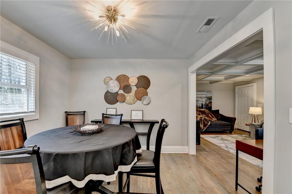 2945 Monterey Drive Decatur, GA 30032 - Photo 21 of 93 a view of a dining room with furniture and wooden floor