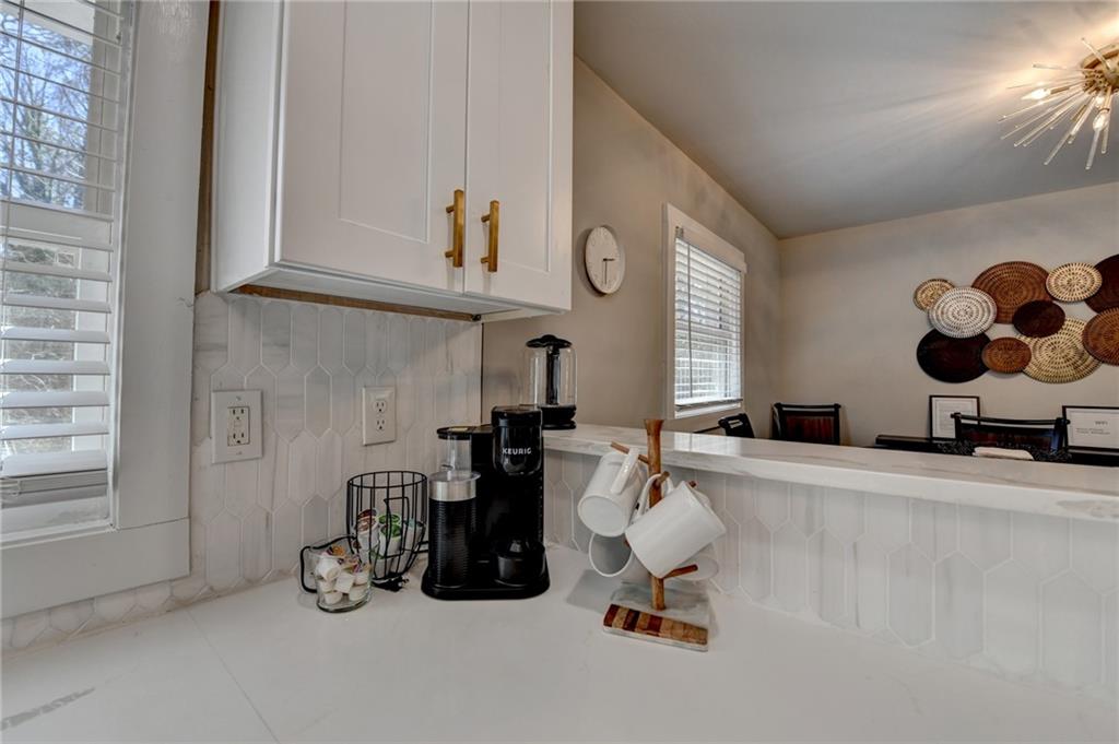 2945 Monterey Drive Decatur, GA 30032 - Photo 27 of 93 a room with gym equipment and view of living room